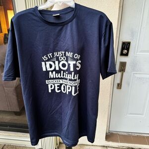Men’s Blue T-Shirt W/Funny Comment. Size Large. Short sleeves.